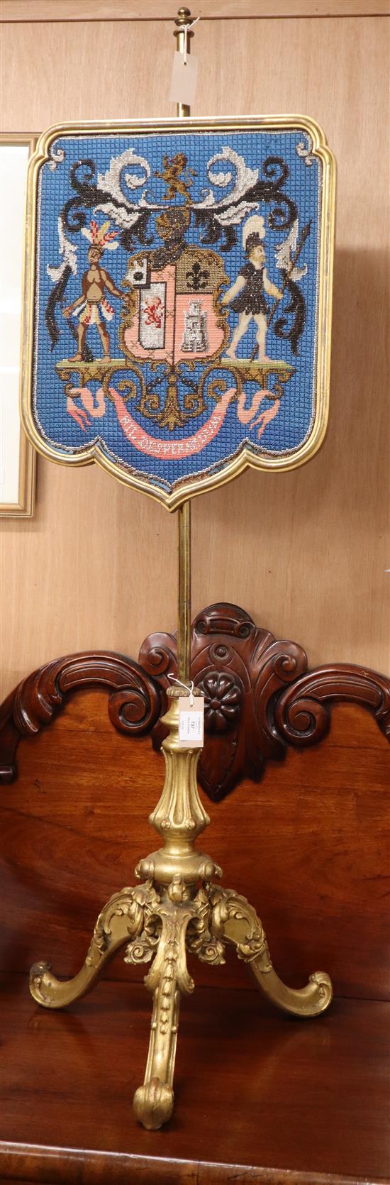 A Victorian giltwood pole screen, armorial beadwork banner W.45cm